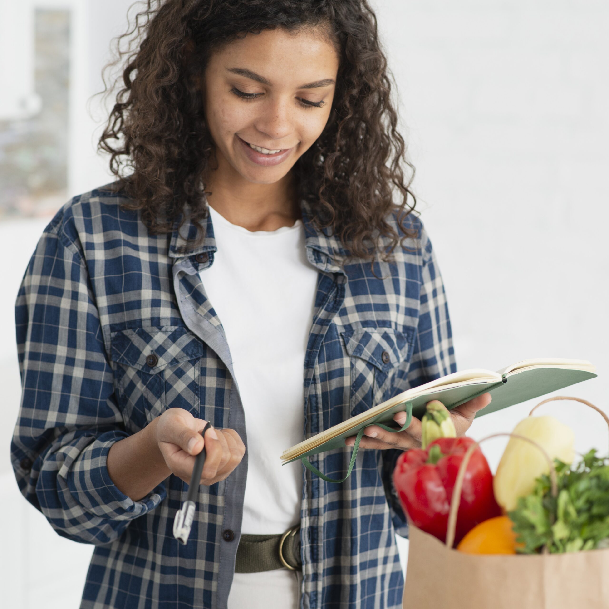 beautiful woman writing notebook