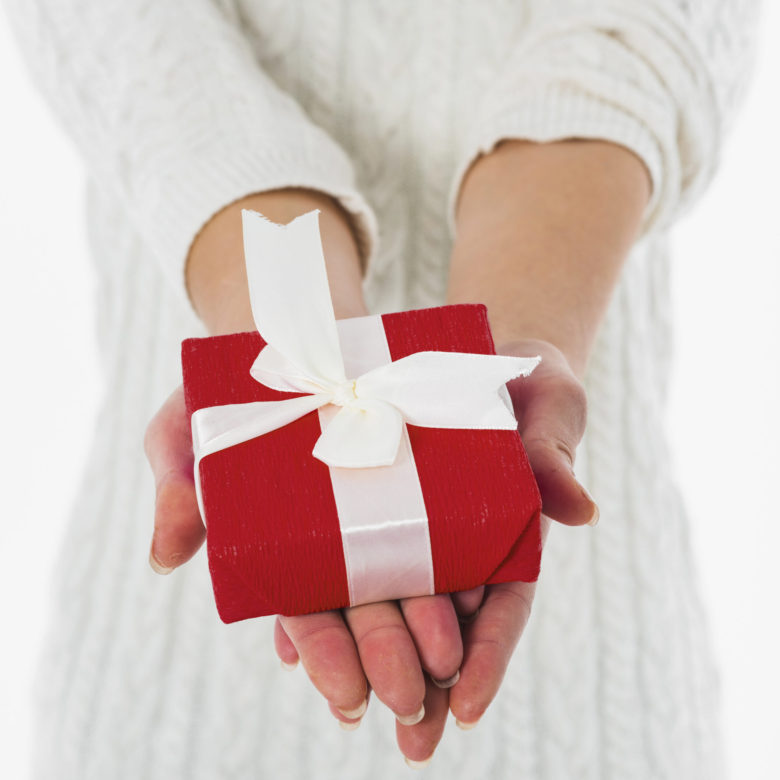 woman holding red gift box hands